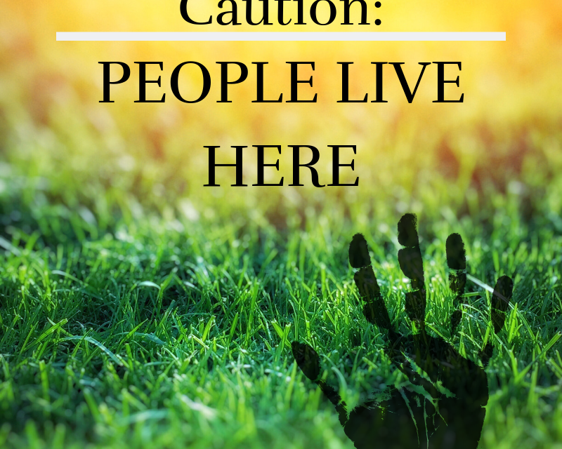 Caution people live here