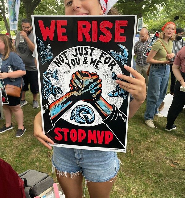 Nina with we rise sign
